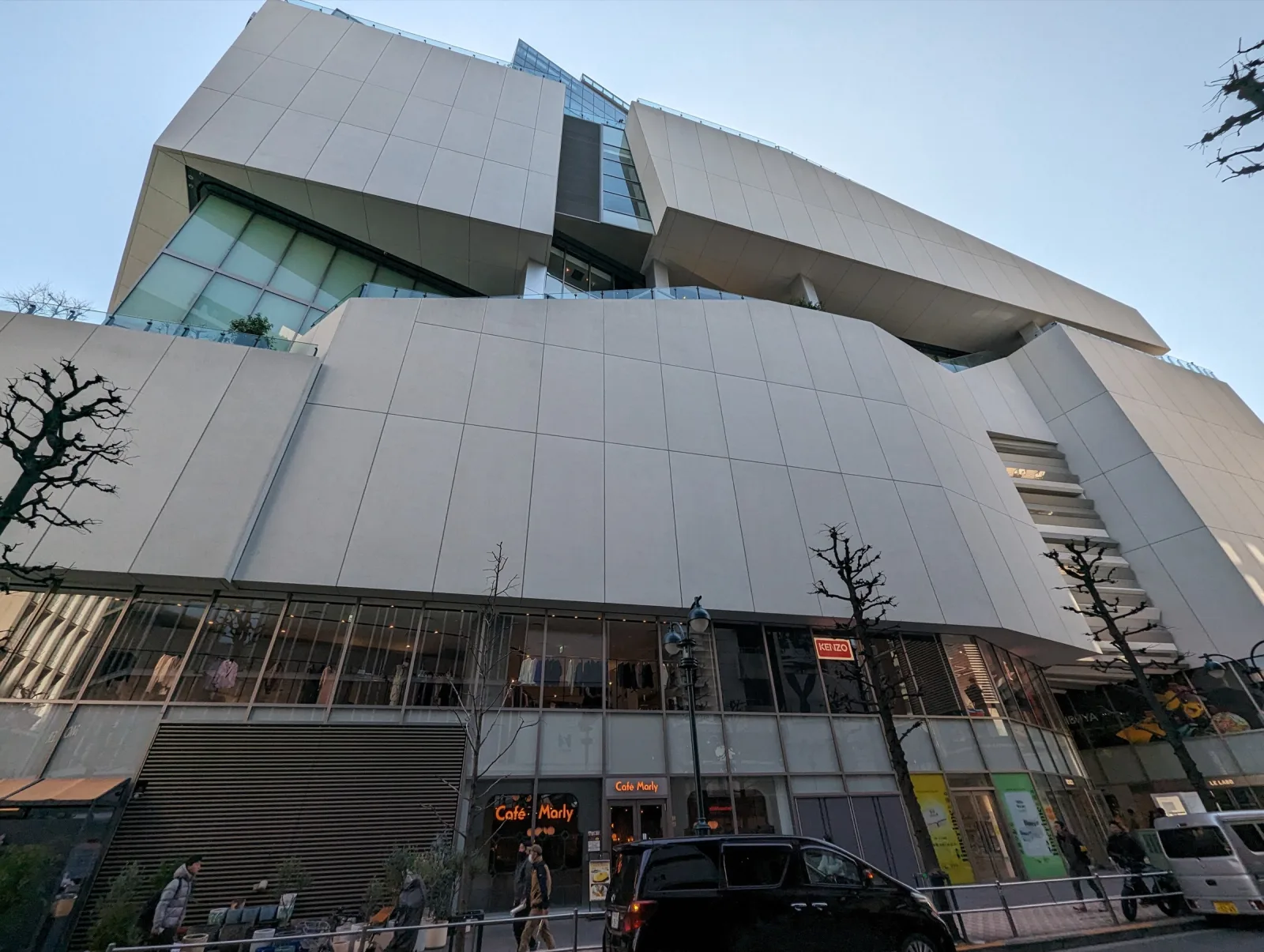 The white facade of Shibuya PARCO, home of Pokémon Center Shibuya and Nintendo TOKYO, seen from the street
